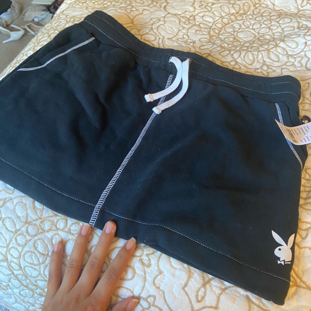 Black playboy skirt size small